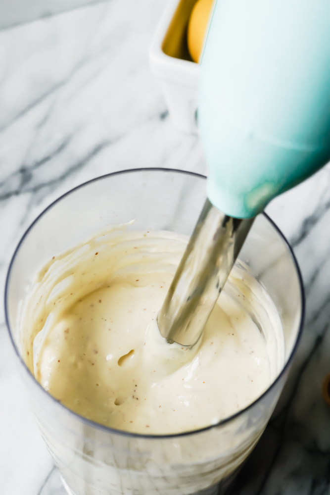 Up close of the finished result of making roasted garlic aioli with and immersion blender.